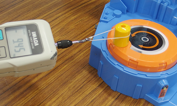 Product strength testing (TOMICA product safety testing spans approximately 500 check points)